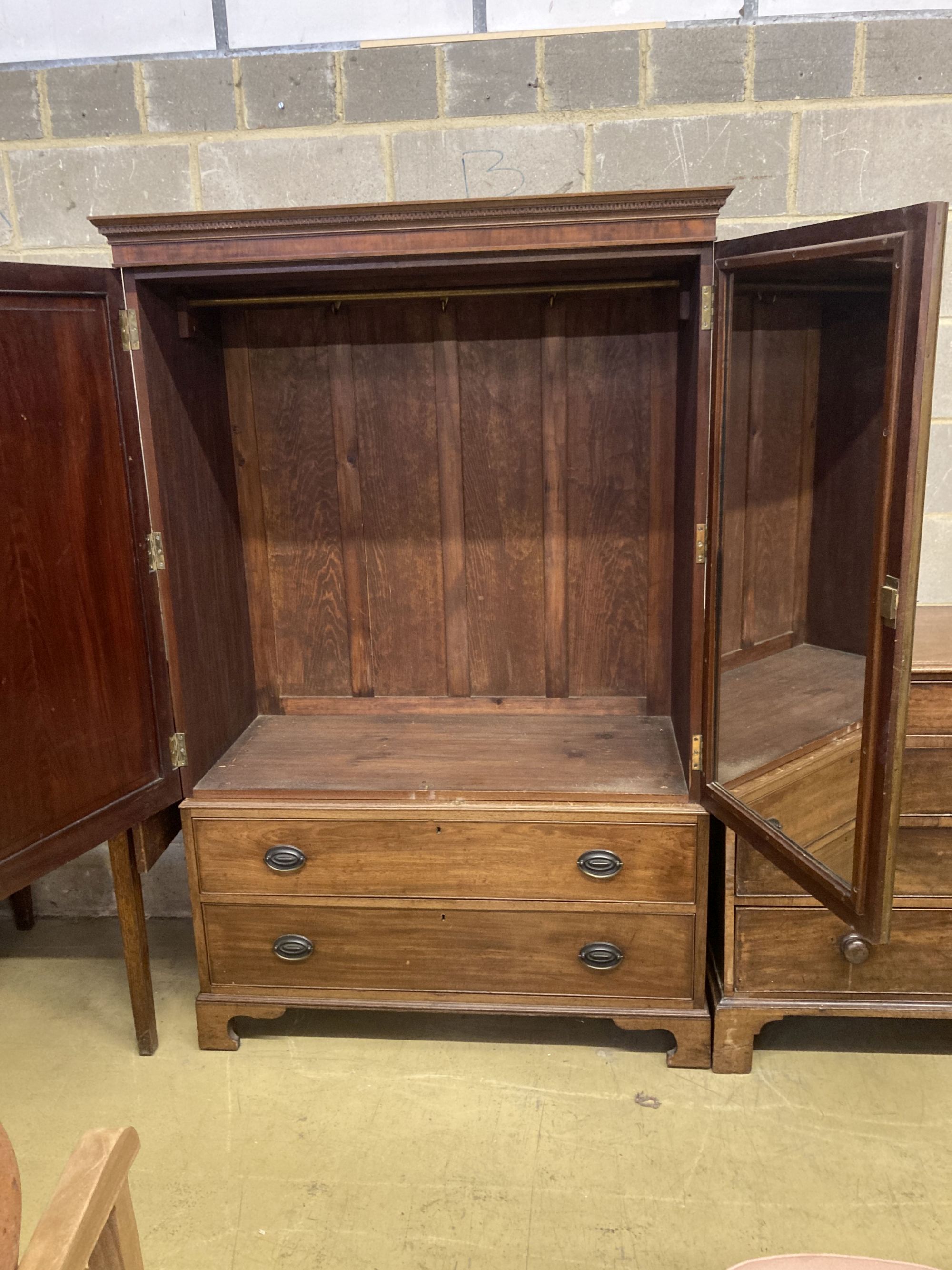 A George III style mahogany two door wardrobe, length 119cm, depth 56cm, height 183cm